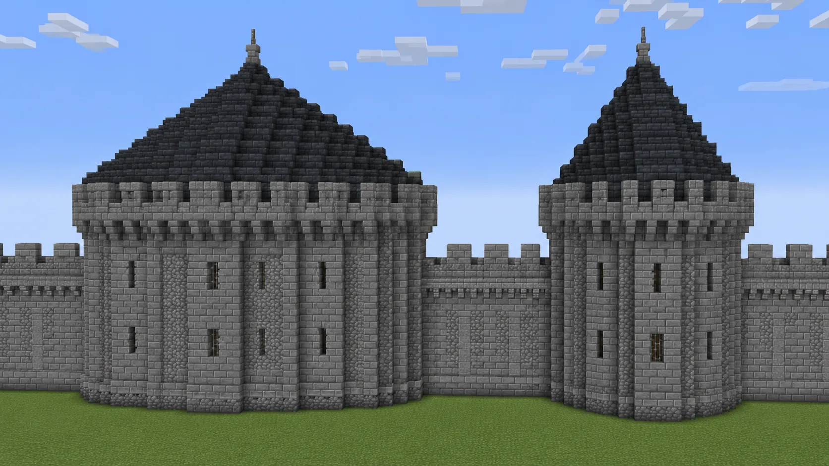 Minecraft chateau-style ellipse flanking tower at 17 by 11 next to a 13-diameter round tower for silhouette comparison