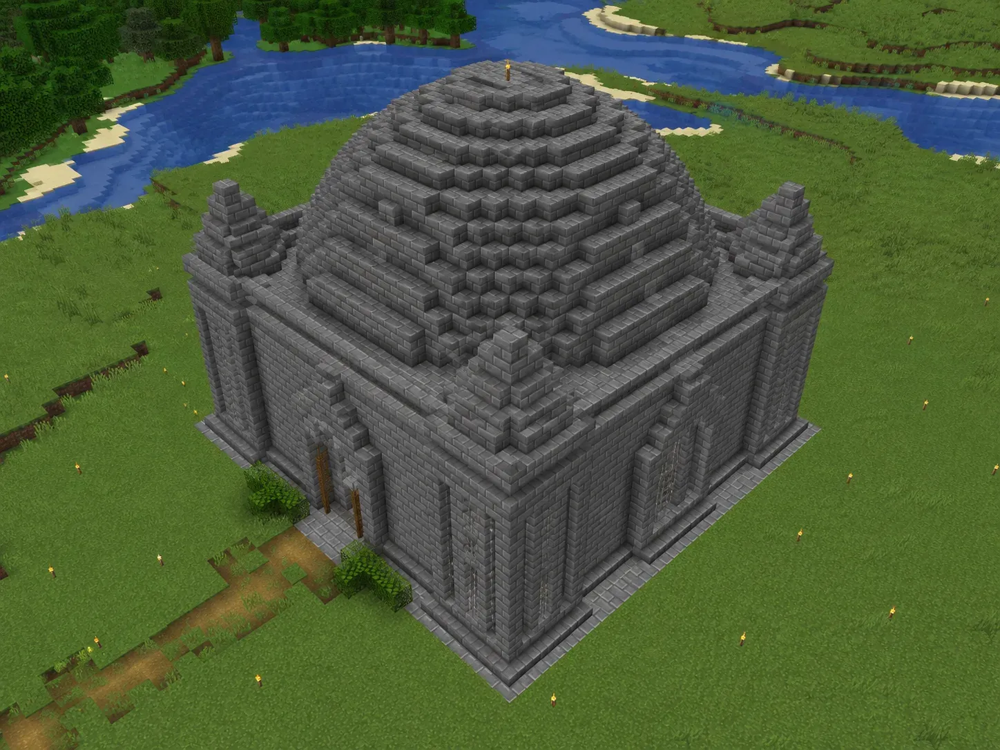 Minecraft stepped dome roof centred on a square stone building with corner spires