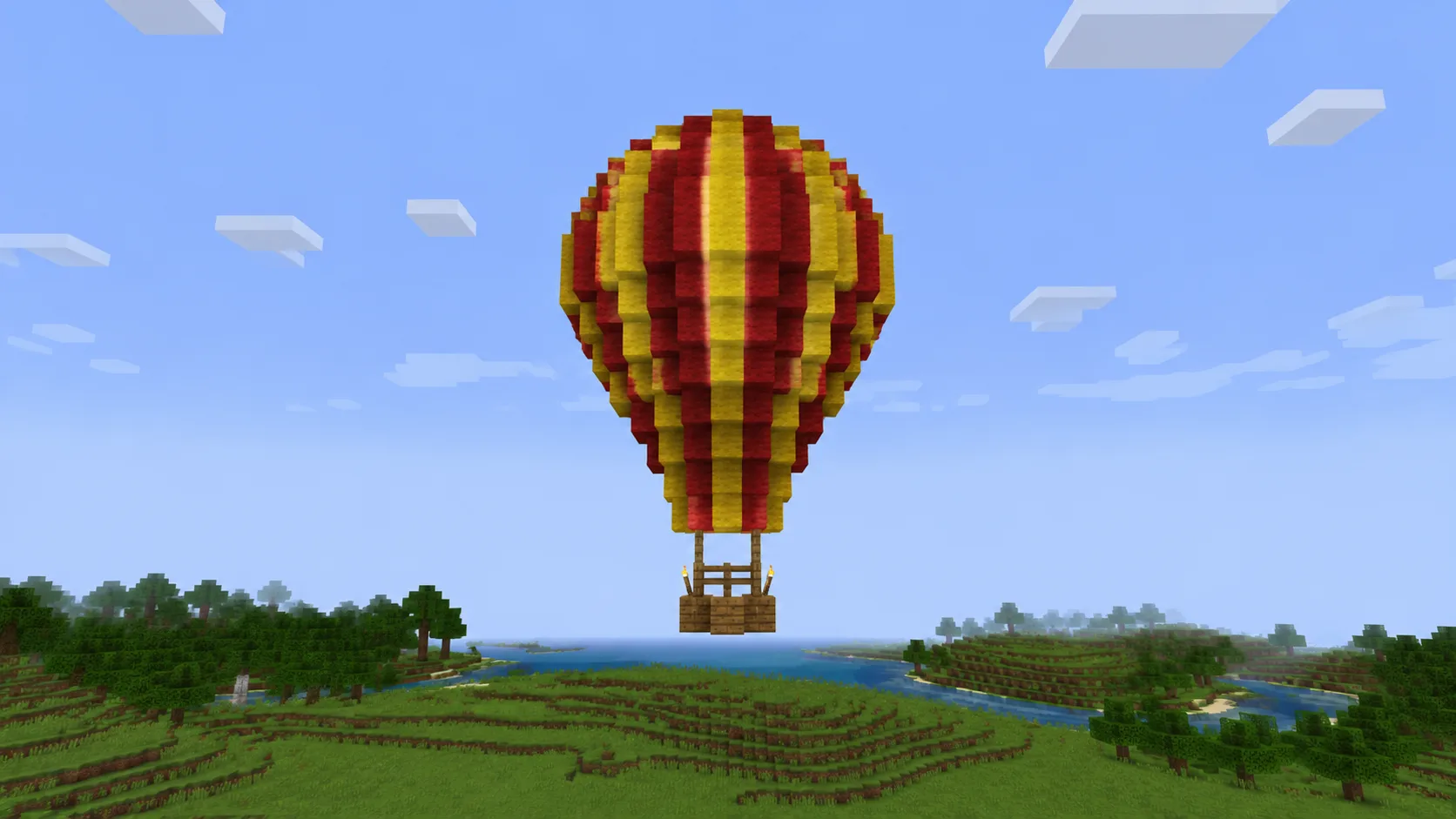 Globo aerostático de Minecraft generado con IA en bloques rojos y amarillos con una canasta colgando