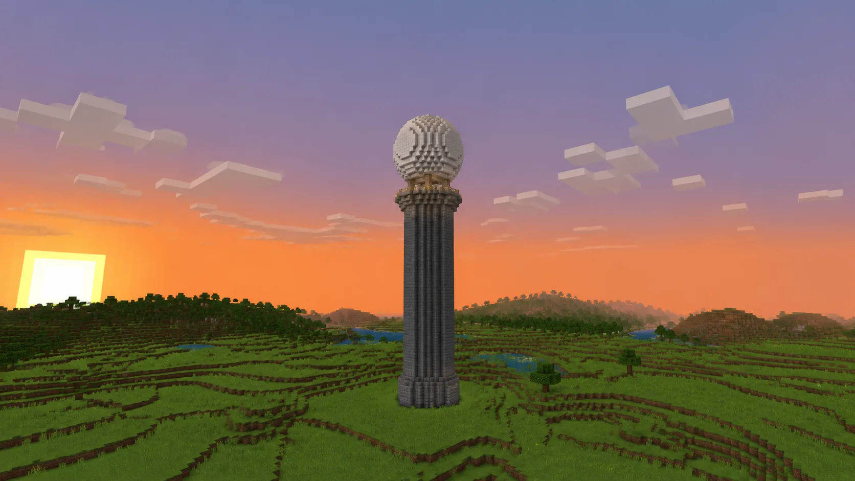 Pequeña esfera como hito en la cima de una torre alta de Minecraft al atardecer